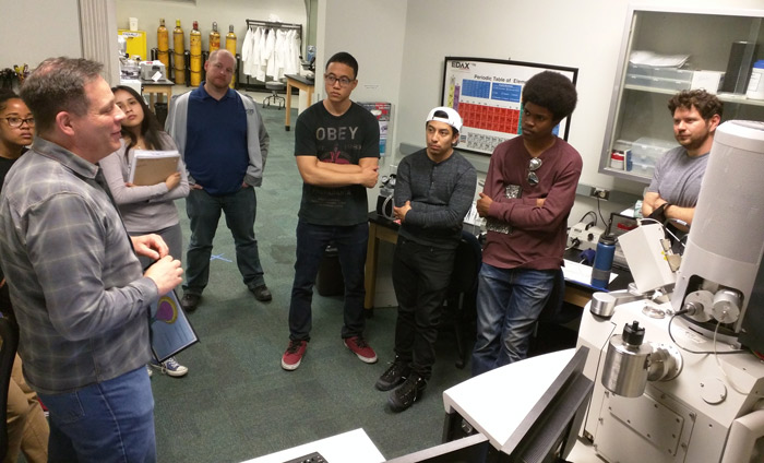 Nanotech students from West LA College visiting USC-CEMMA. Looking at the JEOL SEM.