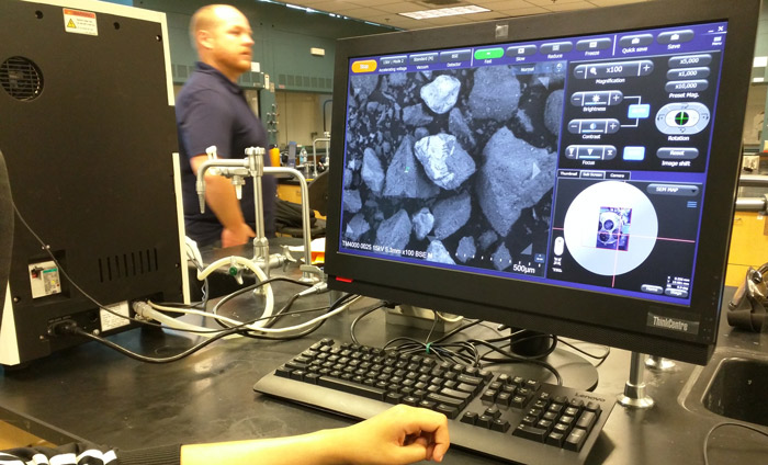 Nanotechnology students at WLAC inspecting a samples with an Hitachi SEM.